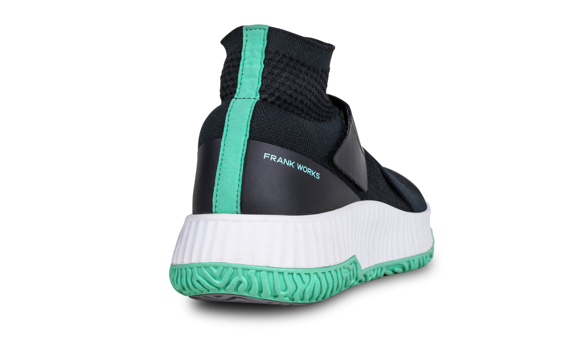 The heel view of the right shoe of the white colorway of The One.