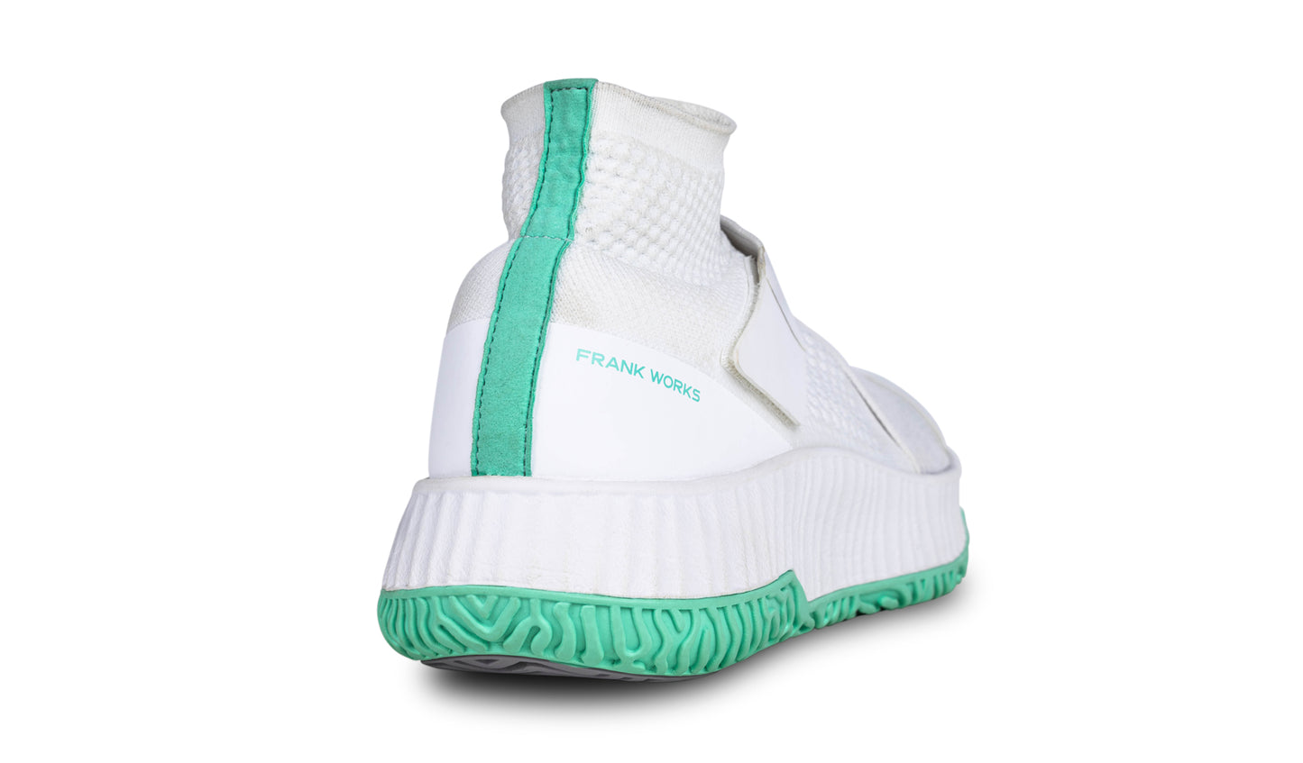 The heel view of the right shoe of the white colorway of The One.