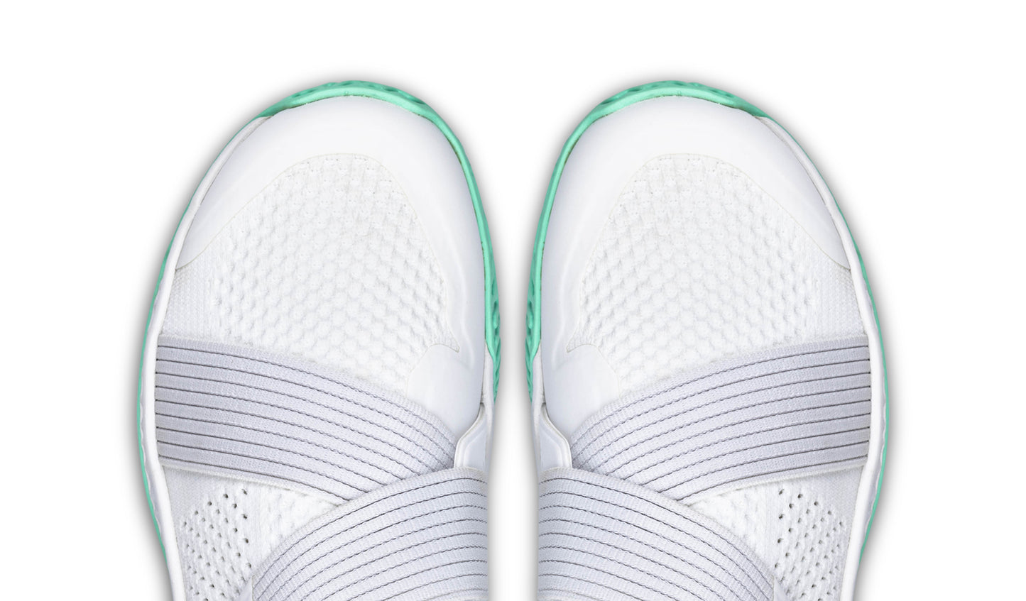 The toe-down view of a pair of the white colorway of The One.