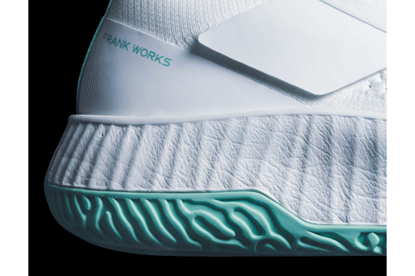 A camera pan of the right shoe of the white/white colorway starting in the heel and finishing in the forefoot.